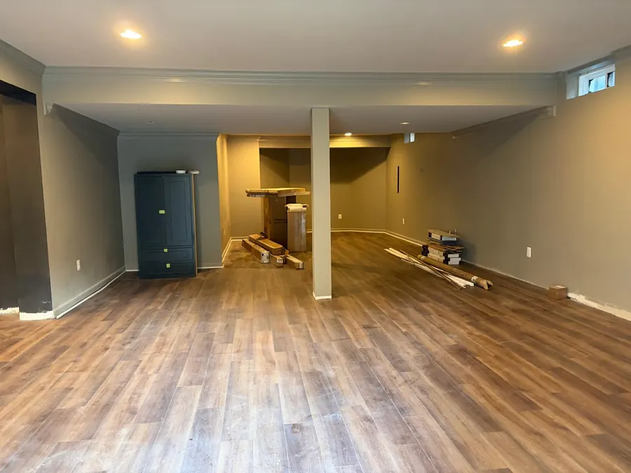 LVP across a large basement rec room