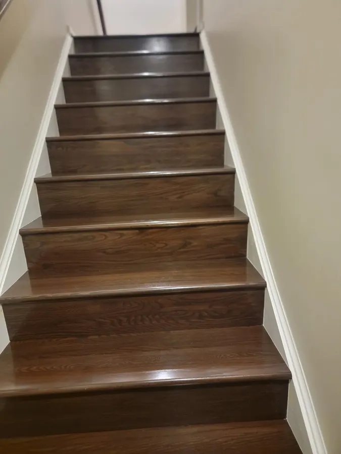 Dark stained stair treads with white risers